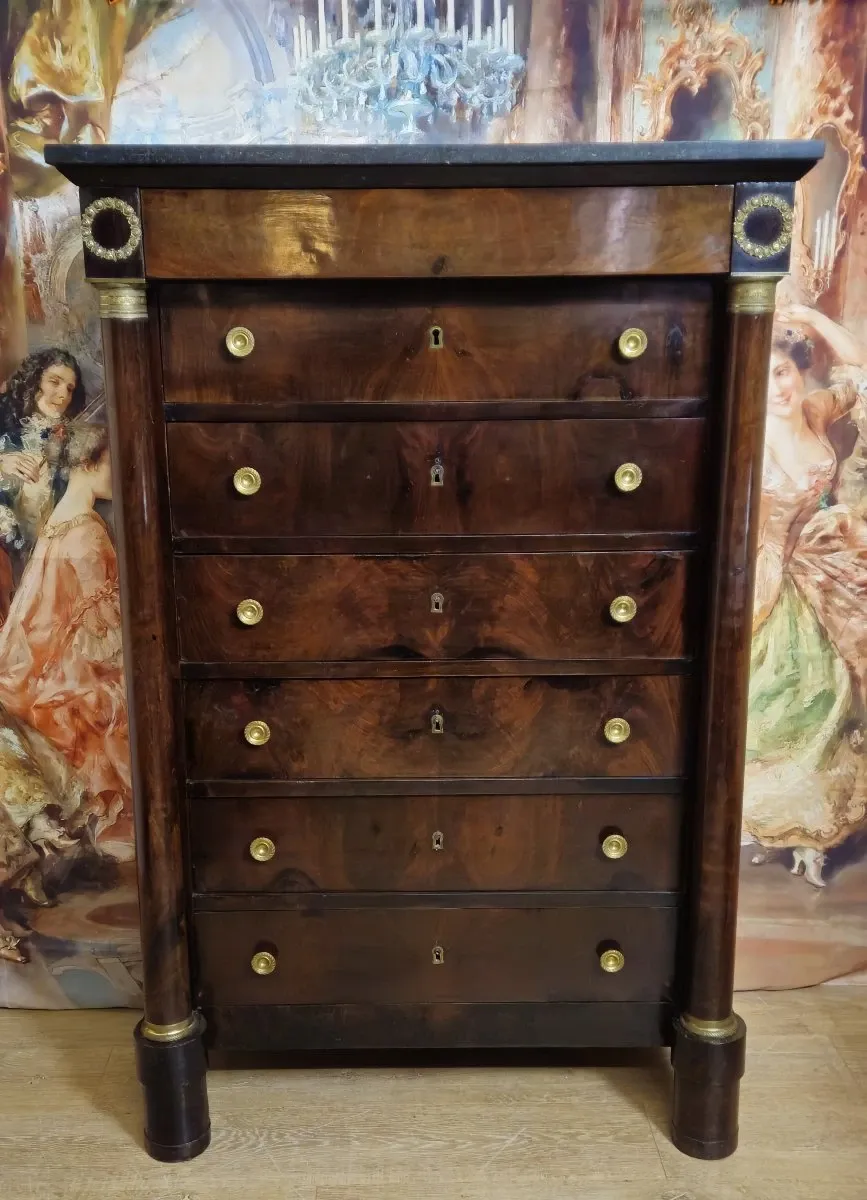 Empire period chest of drawers, early 19th century, in flame mahogany.