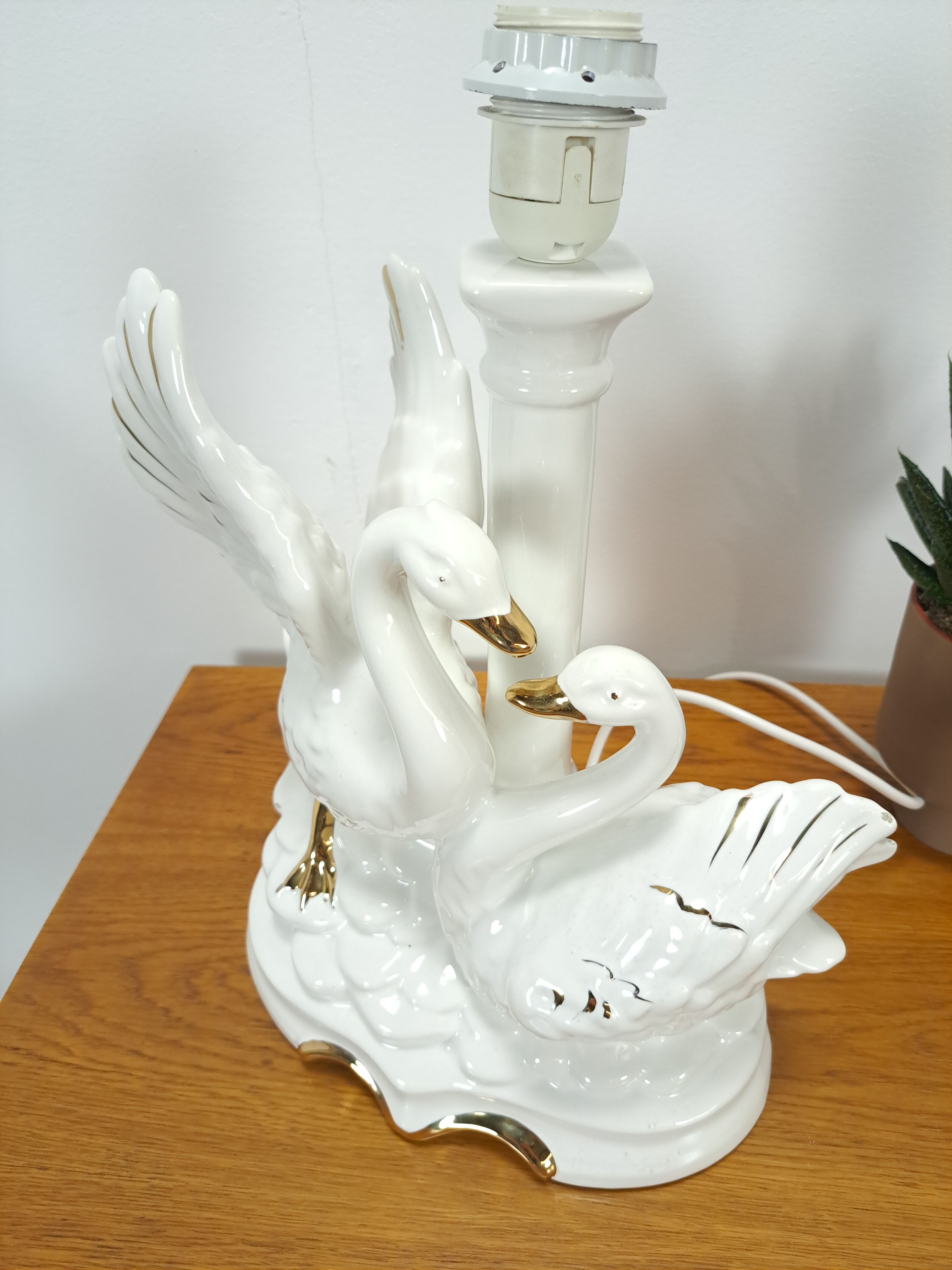 Porcelain lamp swans with vintage gold details