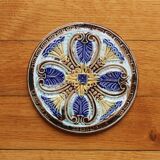 Dessous de bouteille / dessous de plat faïence en barbotine art nouveau fin XIXe début XXe