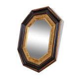 Antique mirror in black and gold octagonal wood
