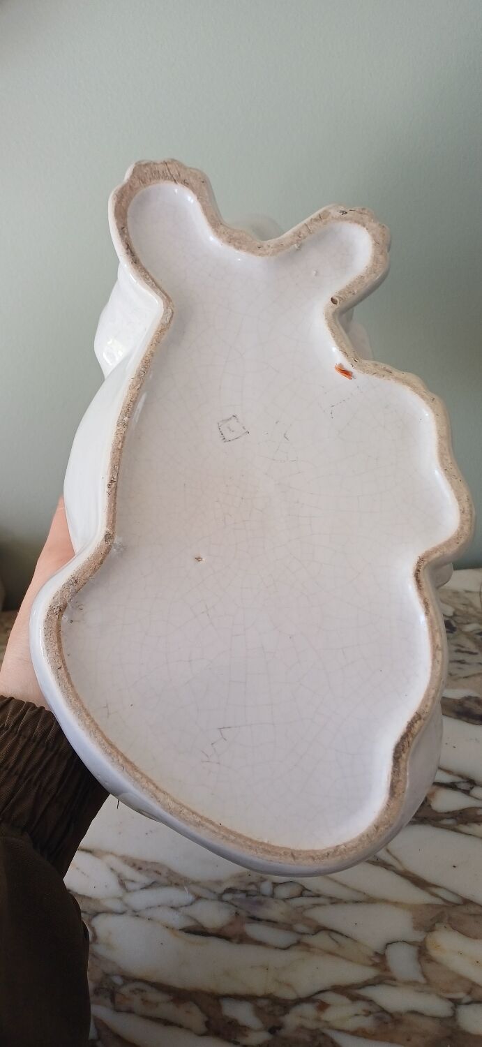 Cracked glazed faience in a zoomorphic design