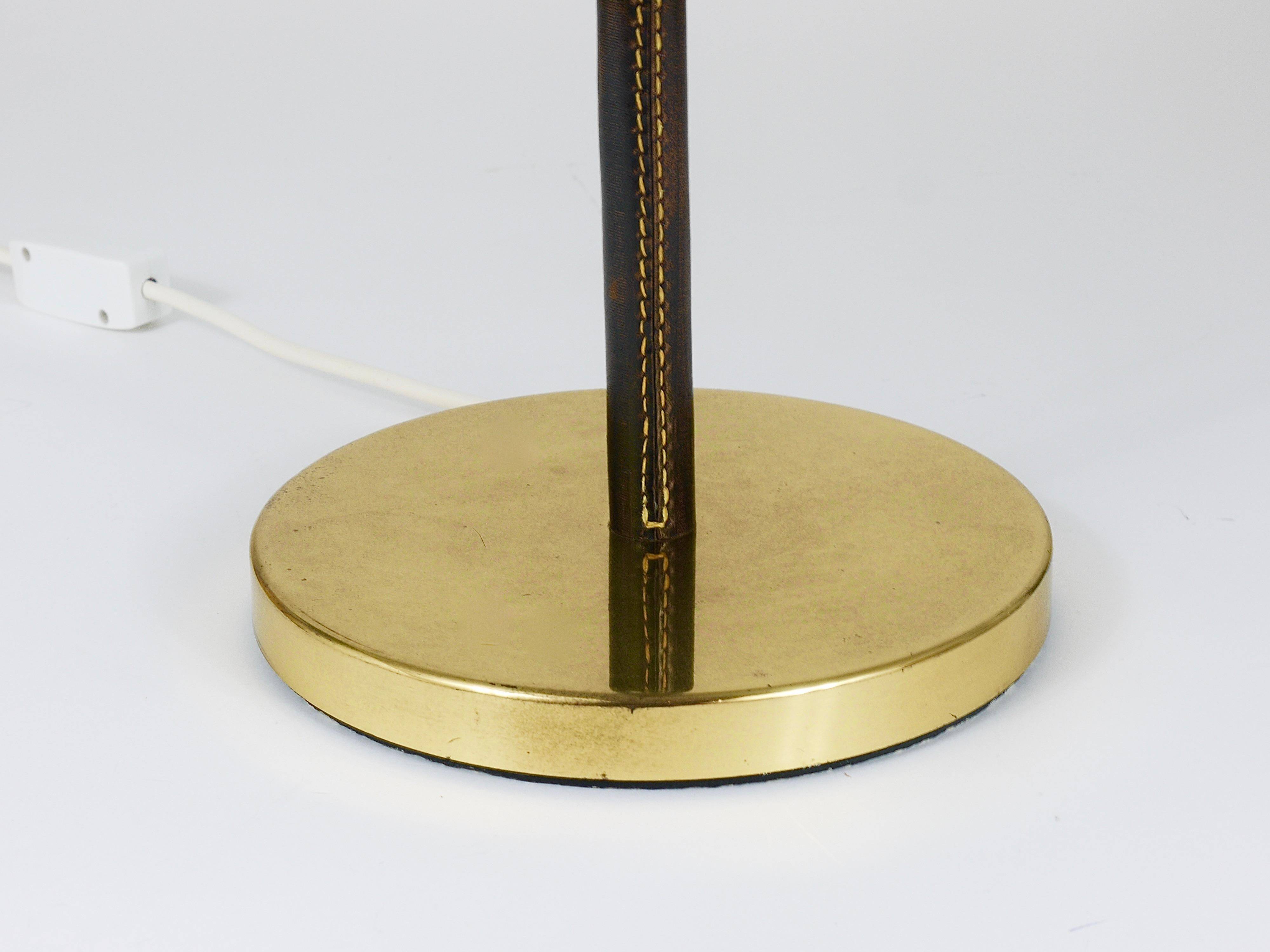 Pair of table lamps or accent lamps in brass and leather by J.T. Kalmar, Mid-Century, Austria, 1960s.