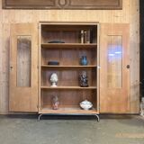 Glass-fronted school cabinet in raw oak