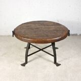 Brutalist round table in wrought iron and wood