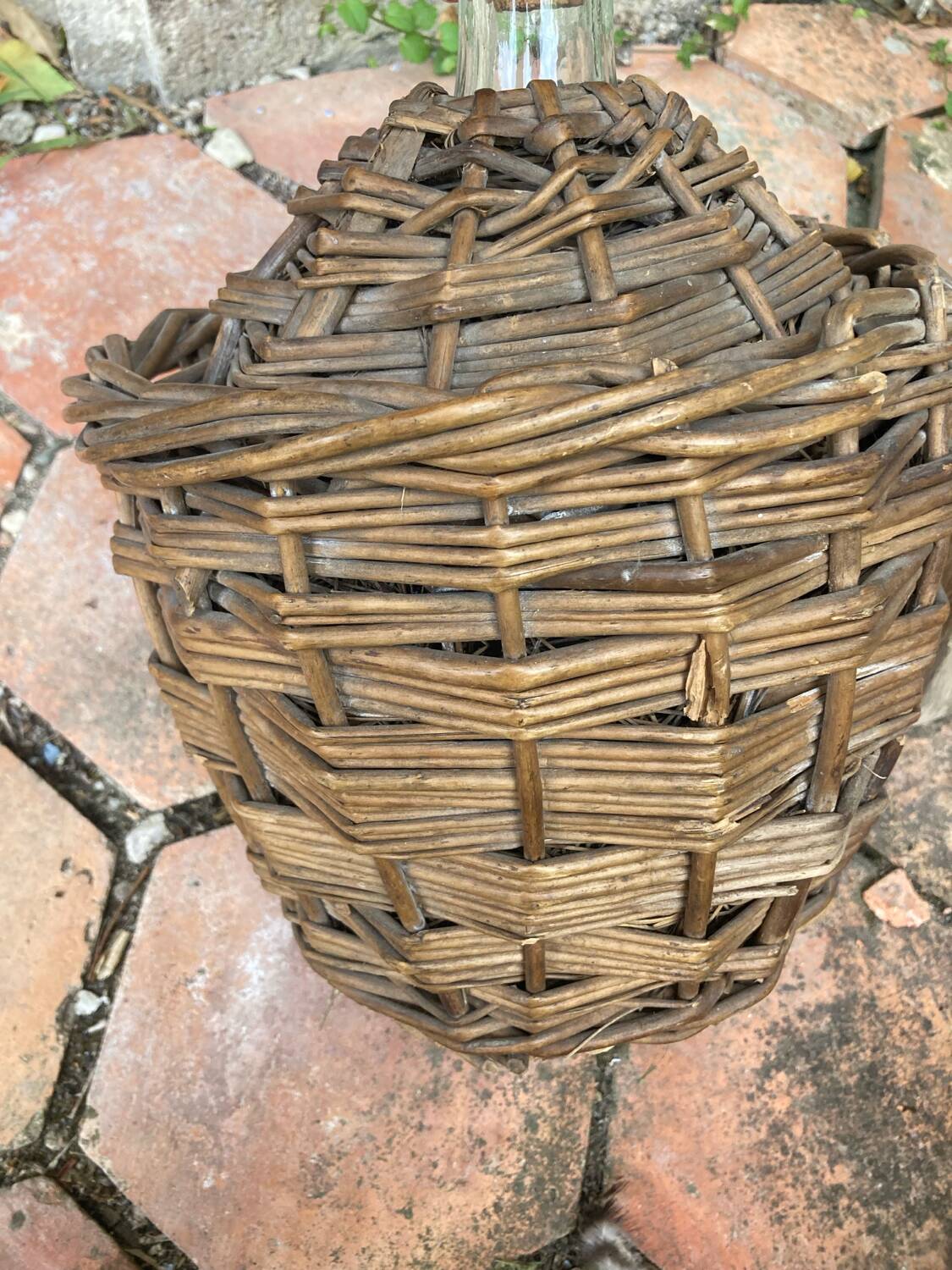 Vintage wicker demijohn