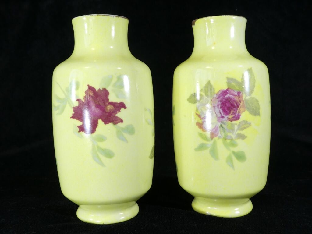 Pair of Limoges porcelain vases decorated with rose bushes