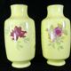 Pair of Limoges porcelain vases decorated with rose bushes