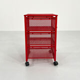 Chest of drawers on red metal wheels, 1980
