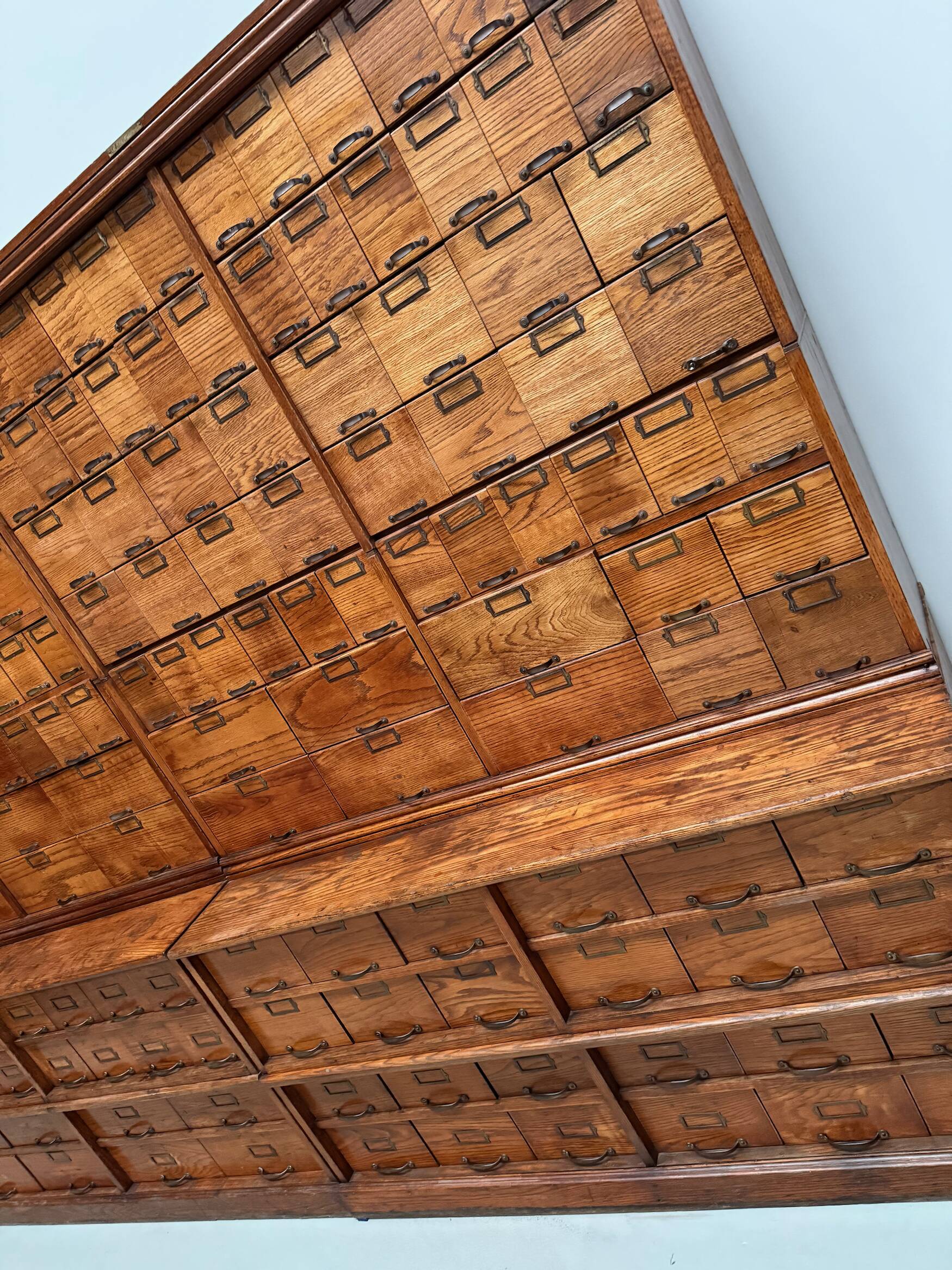 Antique very large American oak grain / apothecary cabinet, ca 1900