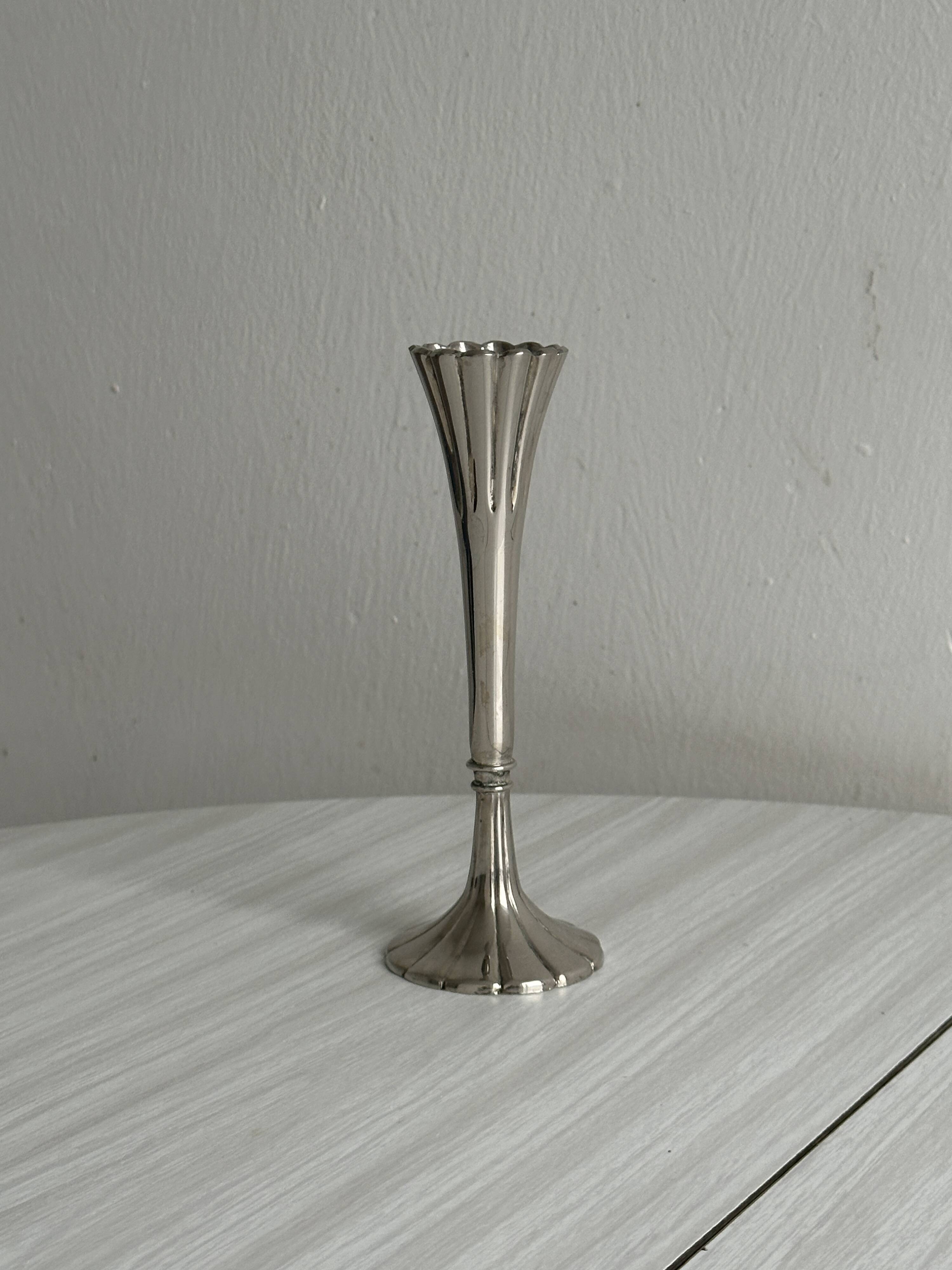 slender chrome metal candlestick