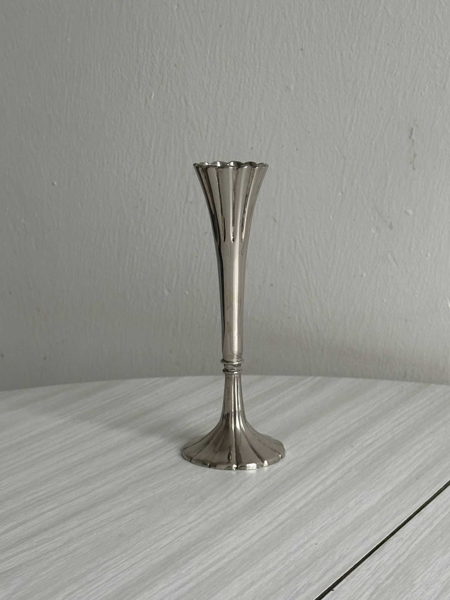 slender chrome metal candlestick