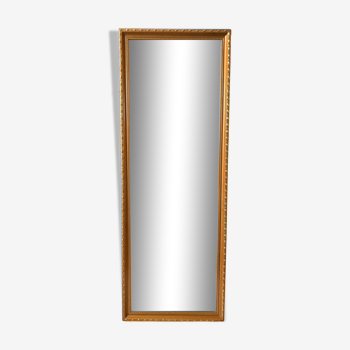 Elongated gilded stucco mirror 60s-70s