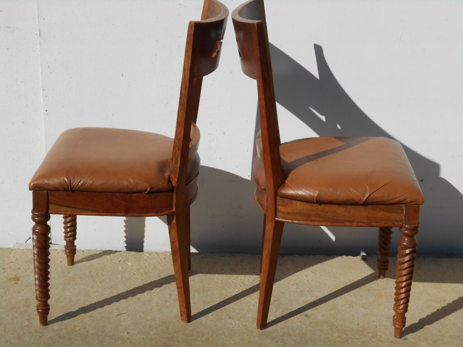 6 exotic wood and leather chairs,