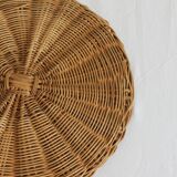 Decorative mirror tray surrounded by vintage rattan / wicker