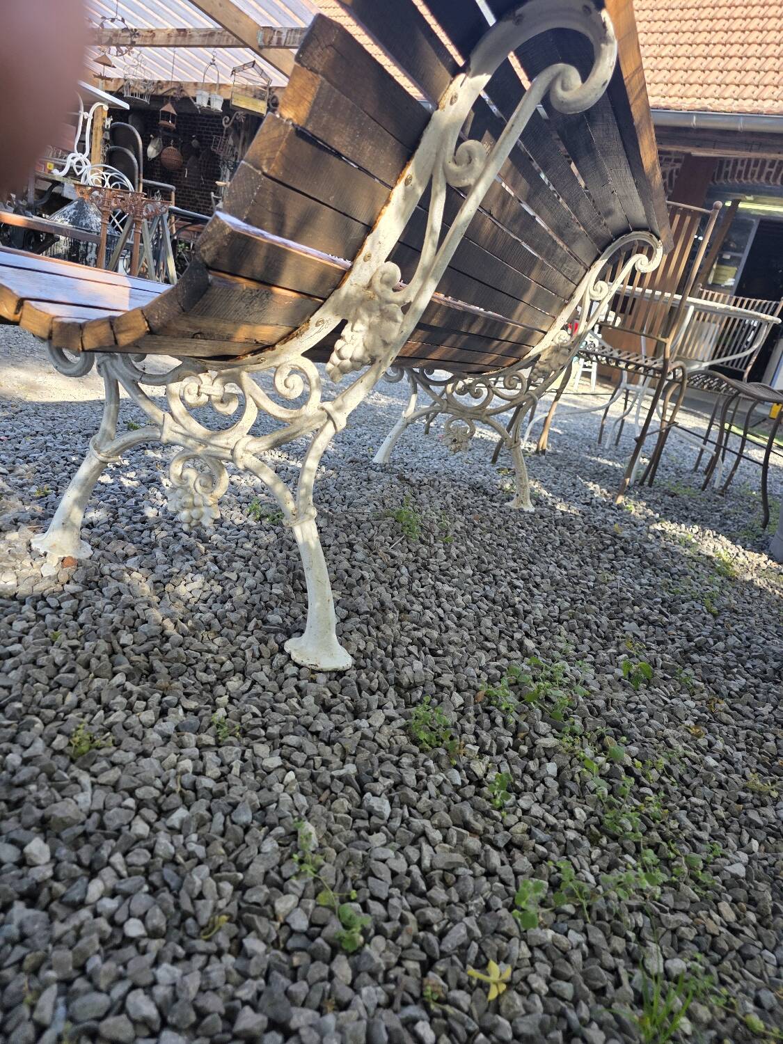 Antique garden bench made of cast iron and oak slats