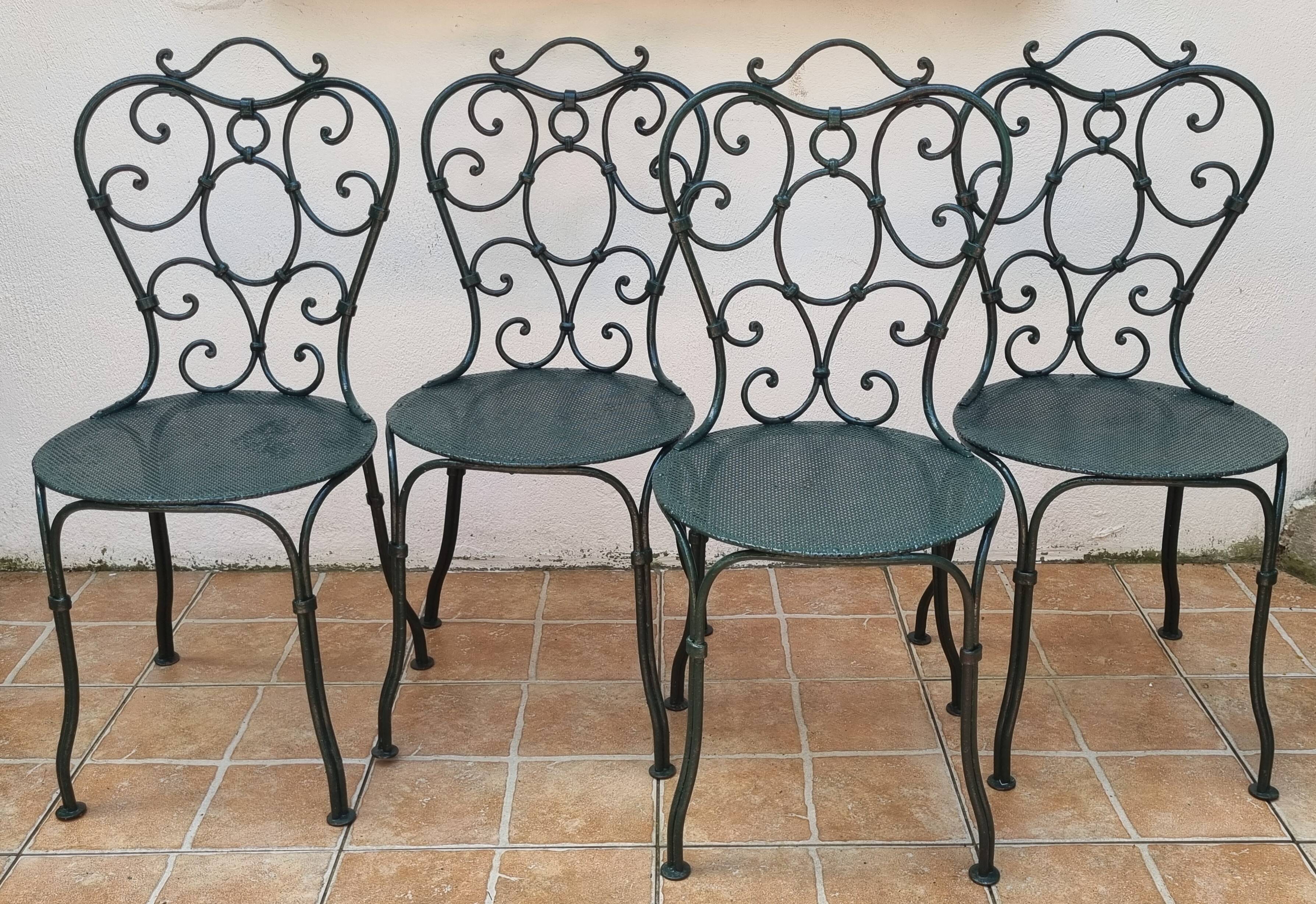 Set of 4 antique garden chairs in wrought iron from 1900.