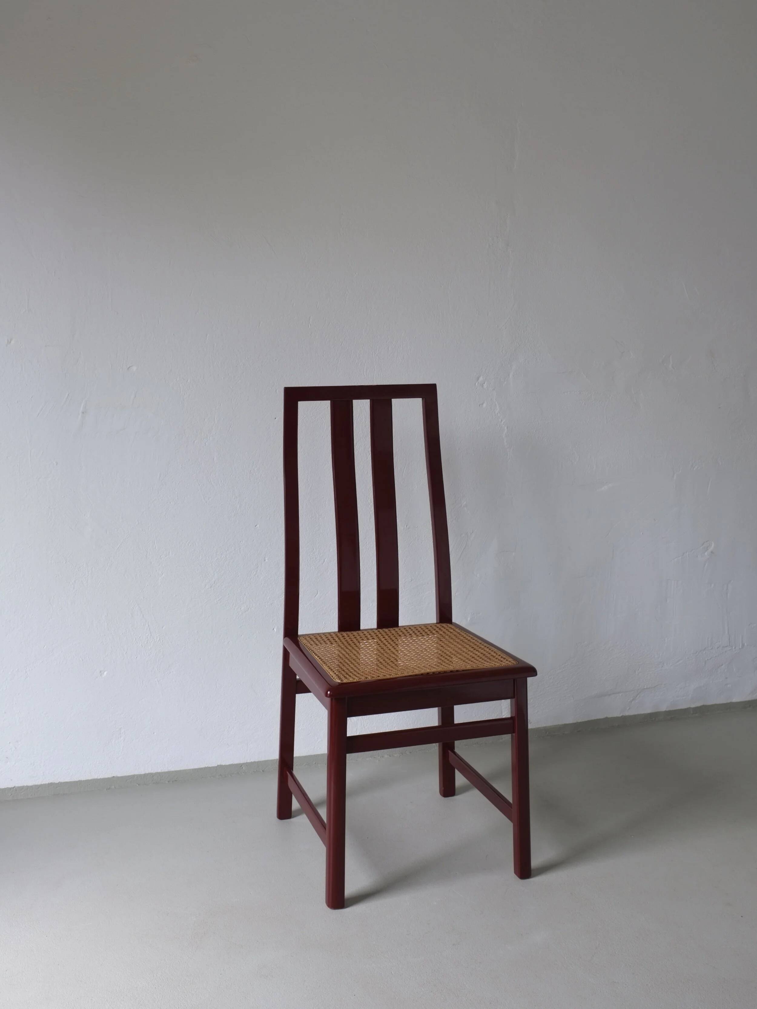 4 Glossy wine red cane seat chairs | Italy | 1970s