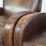 2 fauteuils en cuir de mouton