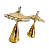 A pair of glass and brass lamps
