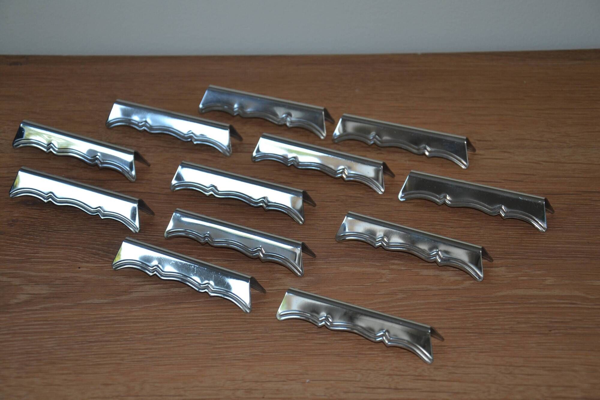 12 silver-plated knife rests