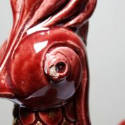 Pair of ceramic glazed candlesticks in the shape of roosters, signed A.G Roger, year 1948.
