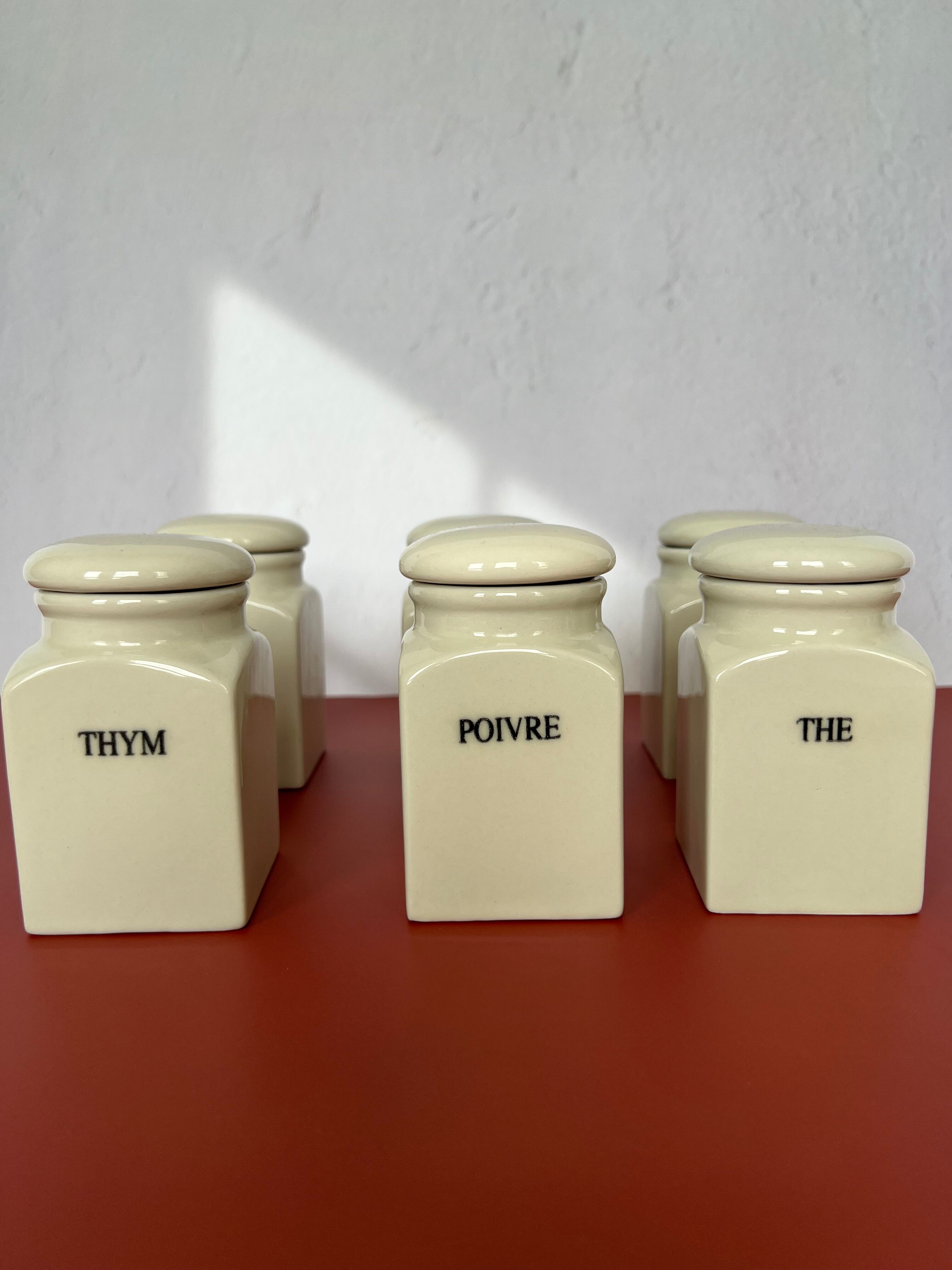 Set of vintage porcelain spice jars