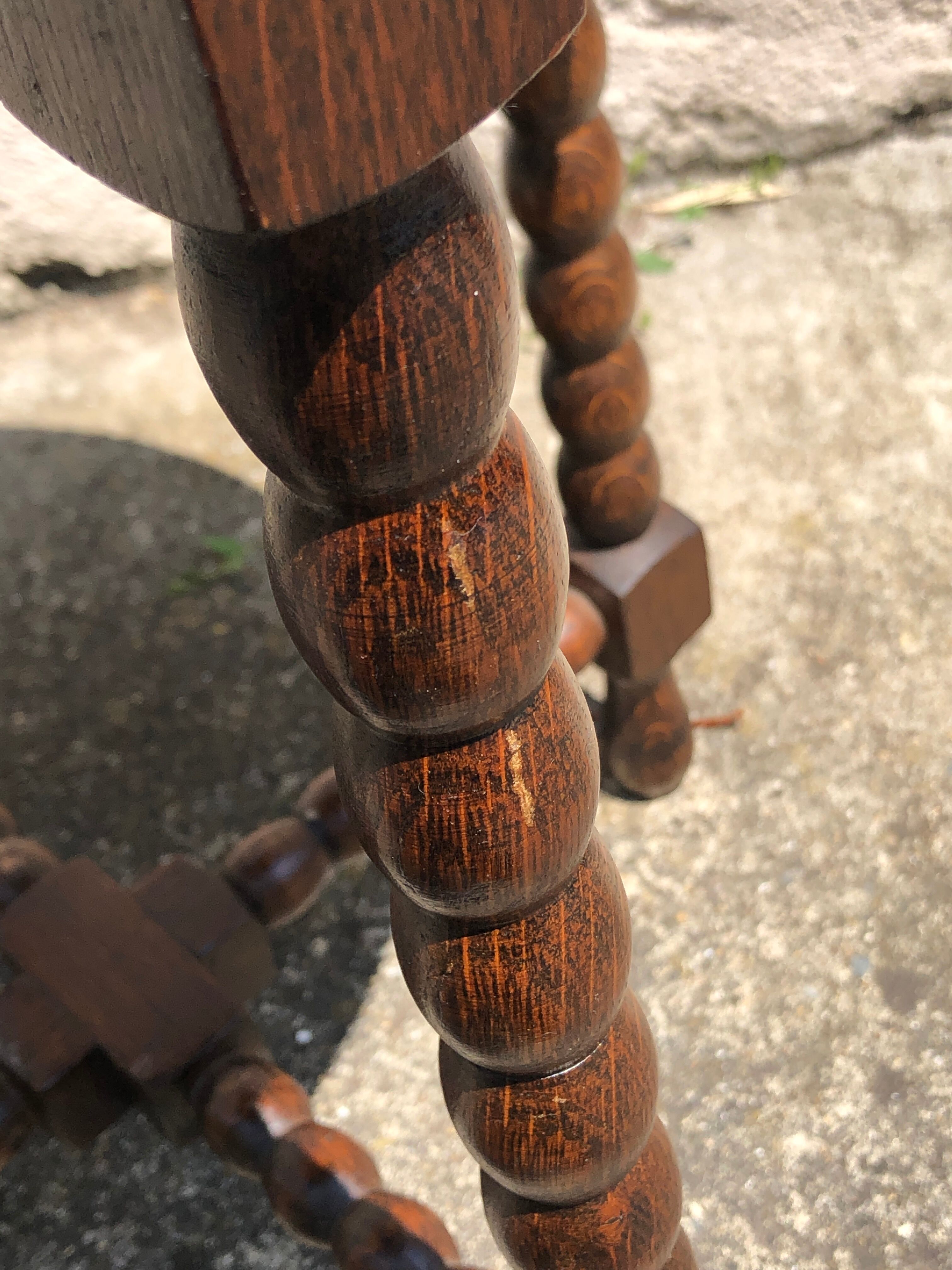 Dark turned wood side table