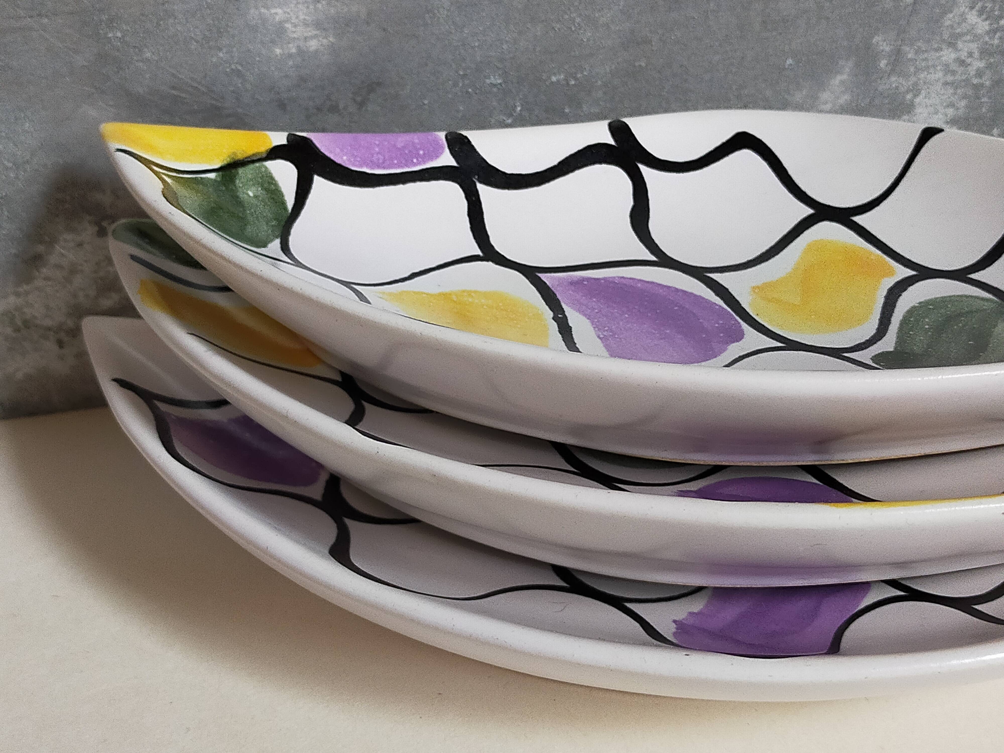 Three vintage free-form ceramic ravine dishes from the 1950s