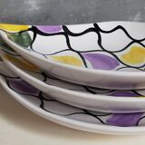 Three vintage free-form ceramic ravine dishes from the 1950s