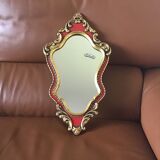 Gold and red mirror brand Deknudt