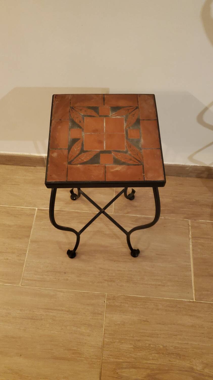 Wrought iron plant holder