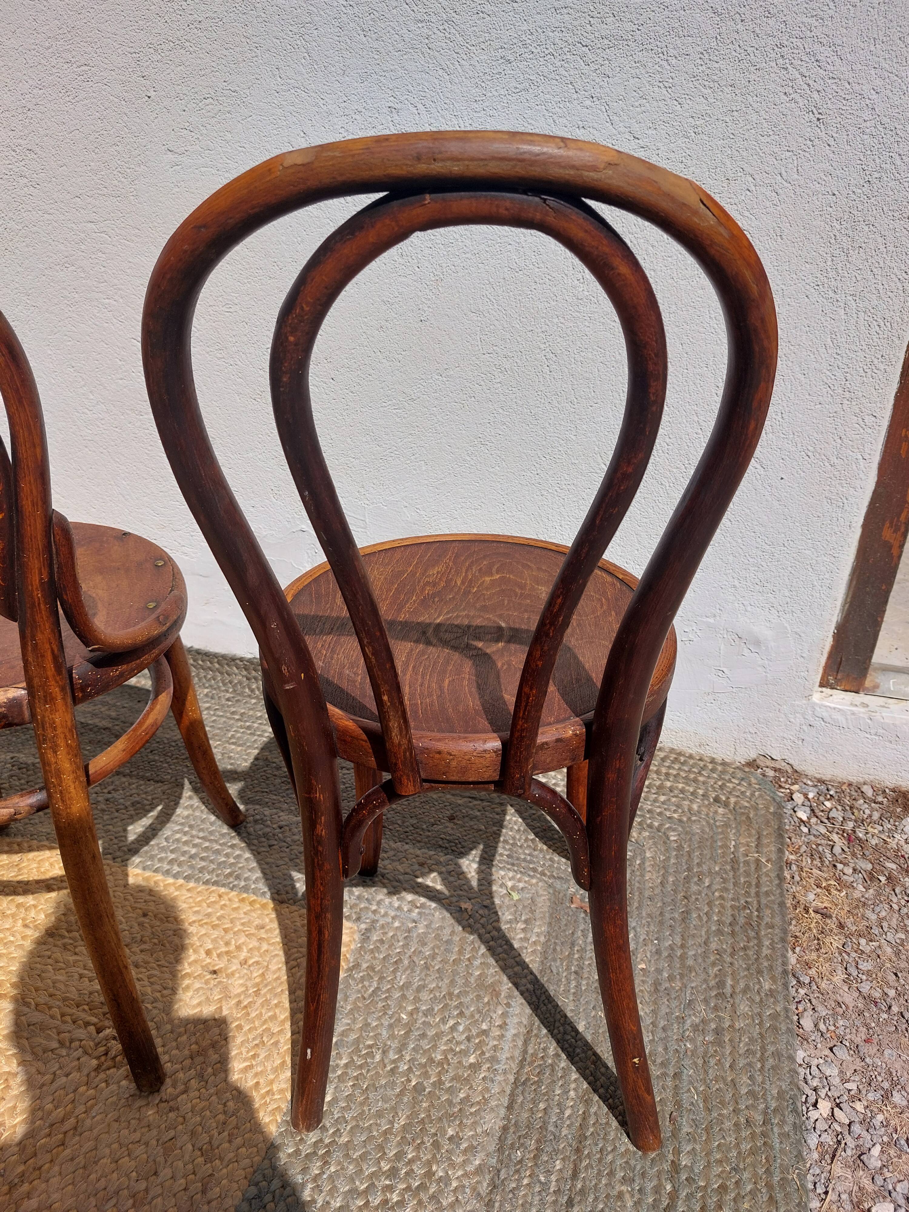 4 curved wooden bistro chairs