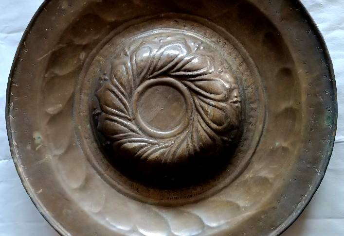 Antique brass alms dish, 17th century