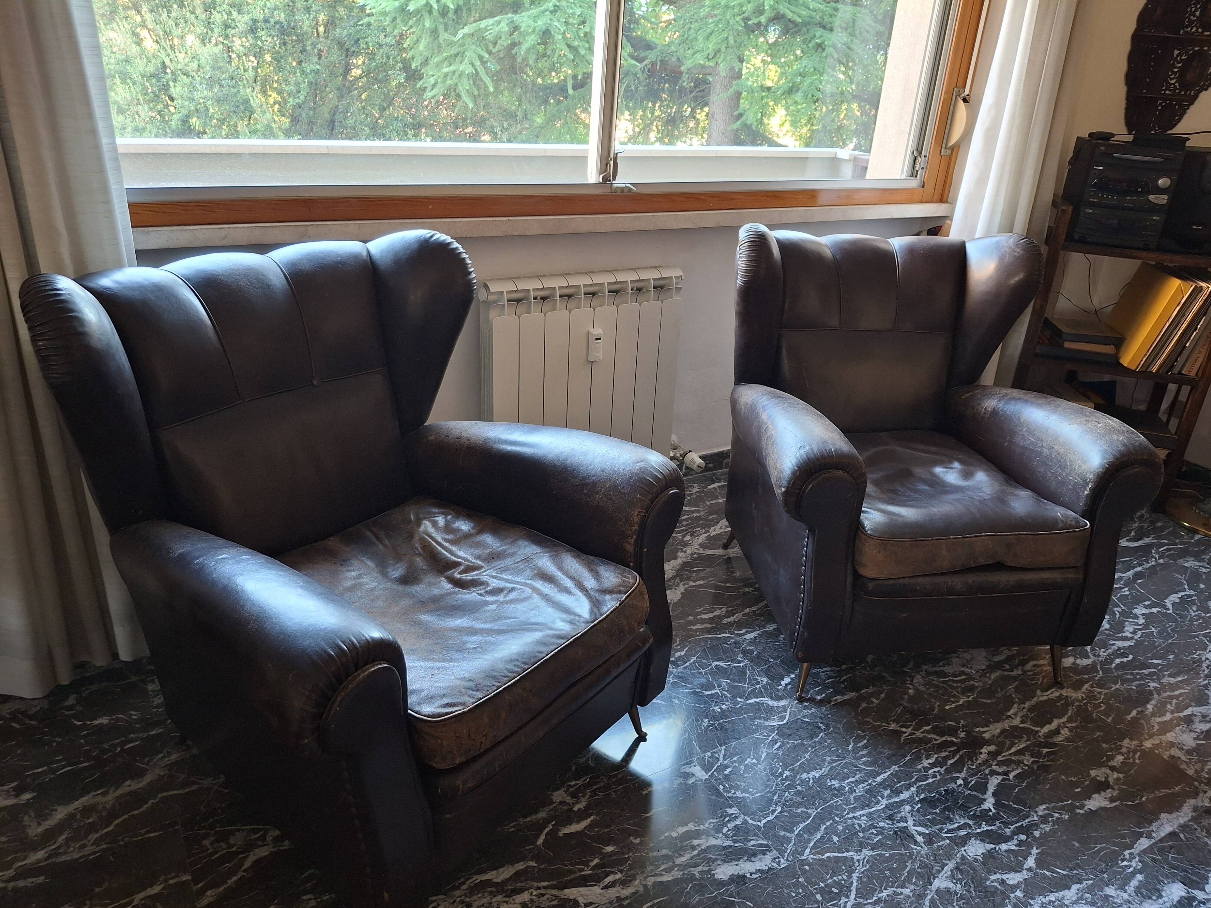 Italian leather bergère armchairs