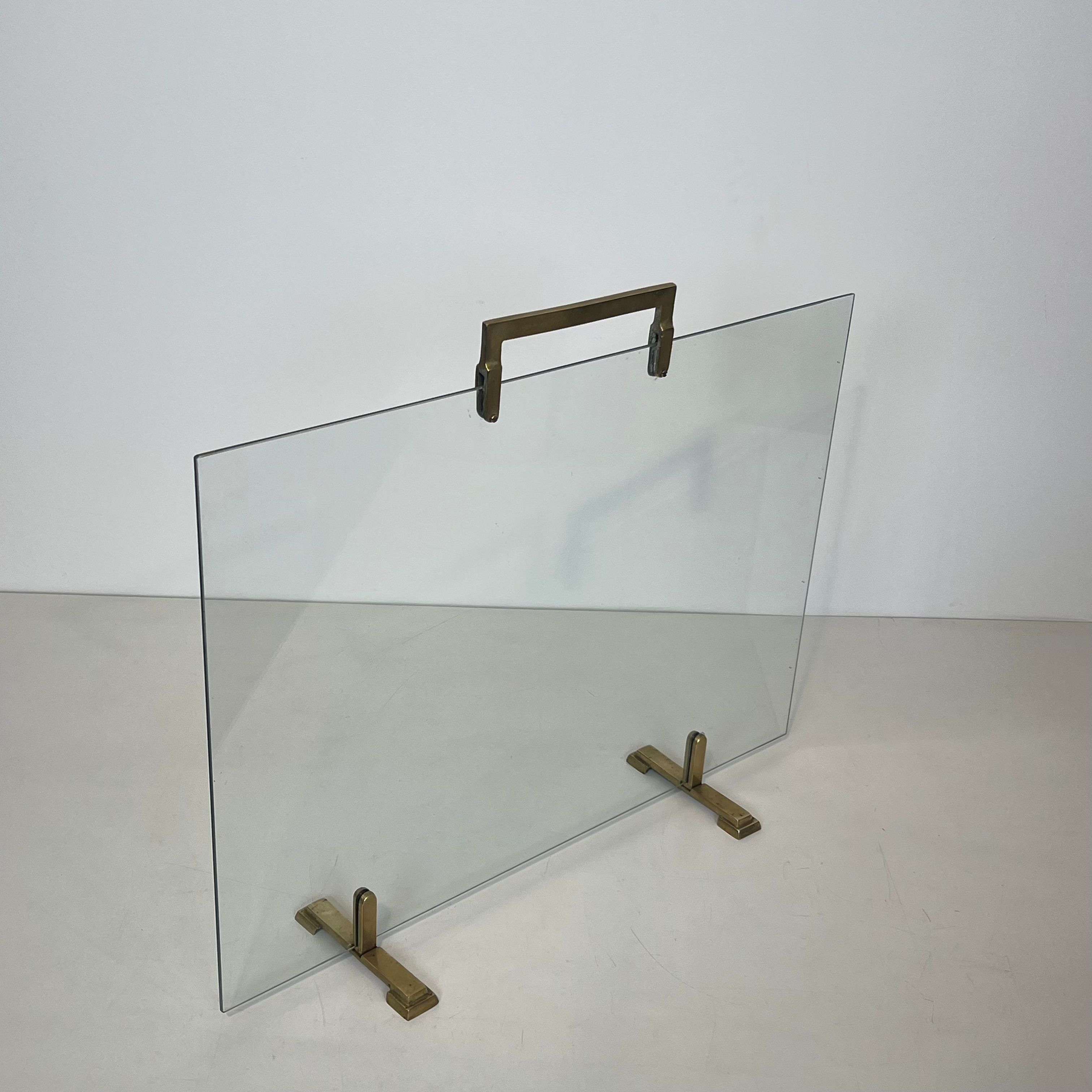Glass and brass fire screen