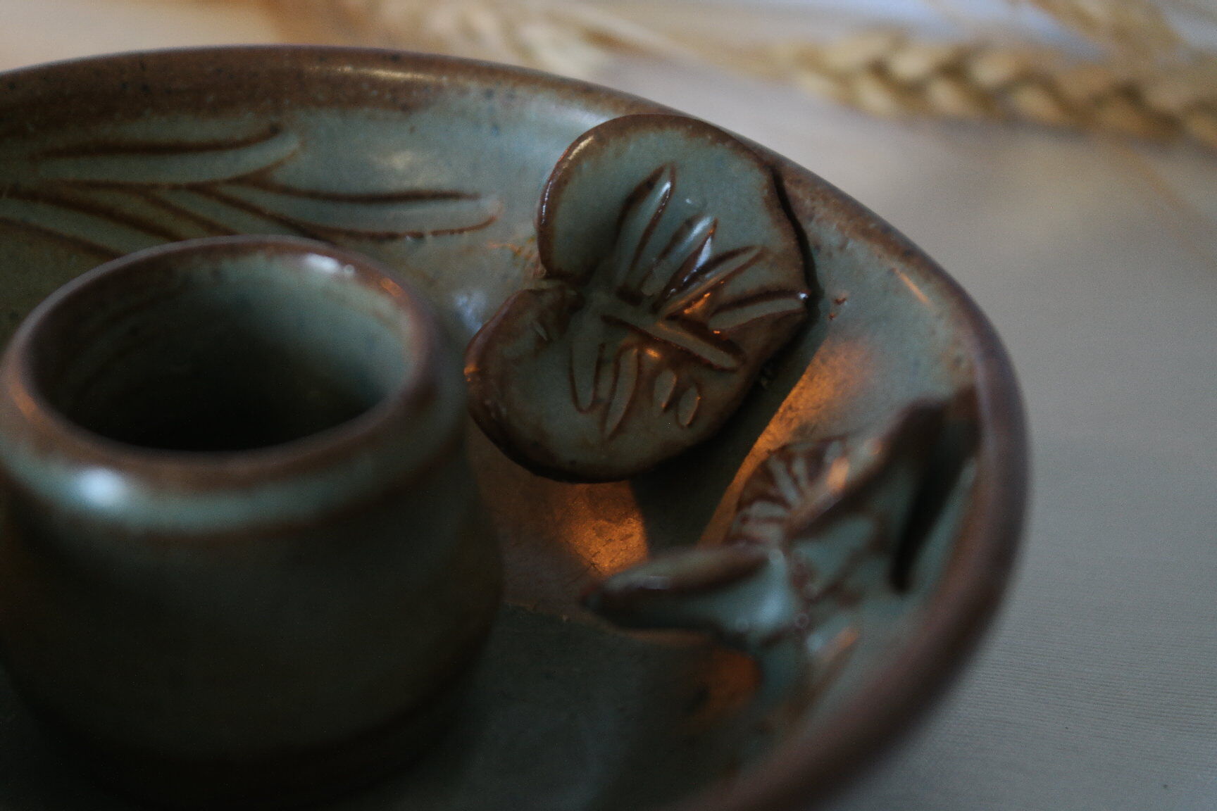 Pair of cellar rat candle holders in glazed sandstone