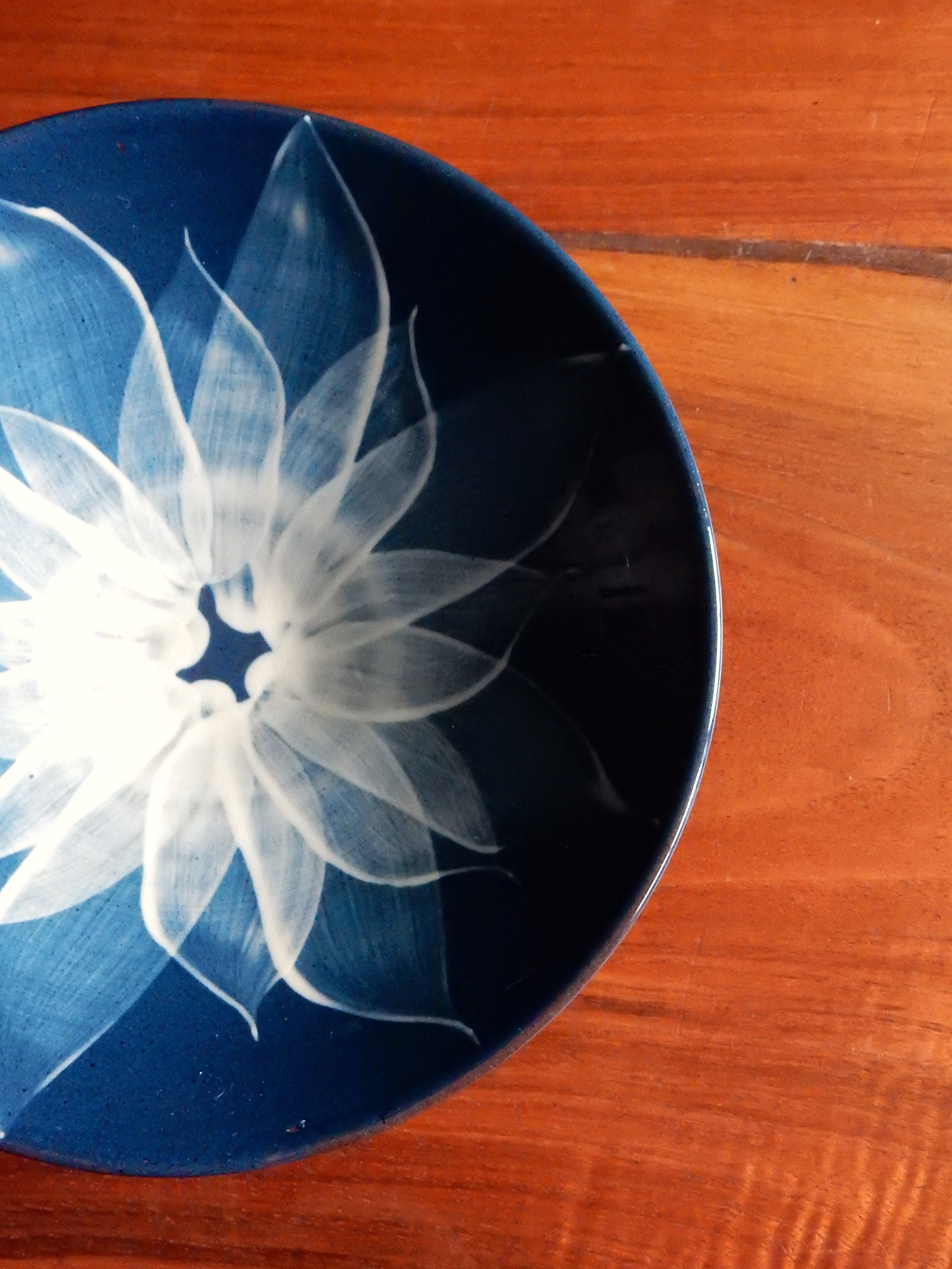 Empty pocket, blue ceramic bowl minimalist floral pattern