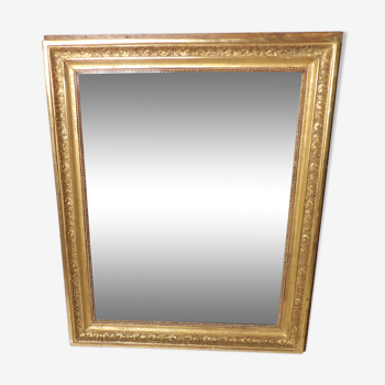 Antique mirror with gilded wooden frame