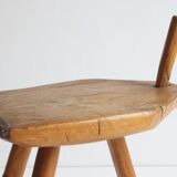 Brutalist tripod stool in carved wood, 1950s