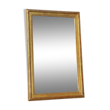 Miroir en bois doré avec moulure perlée - 70x46cm