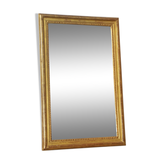 Miroir en bois doré avec moulure perlée - 70x46cm