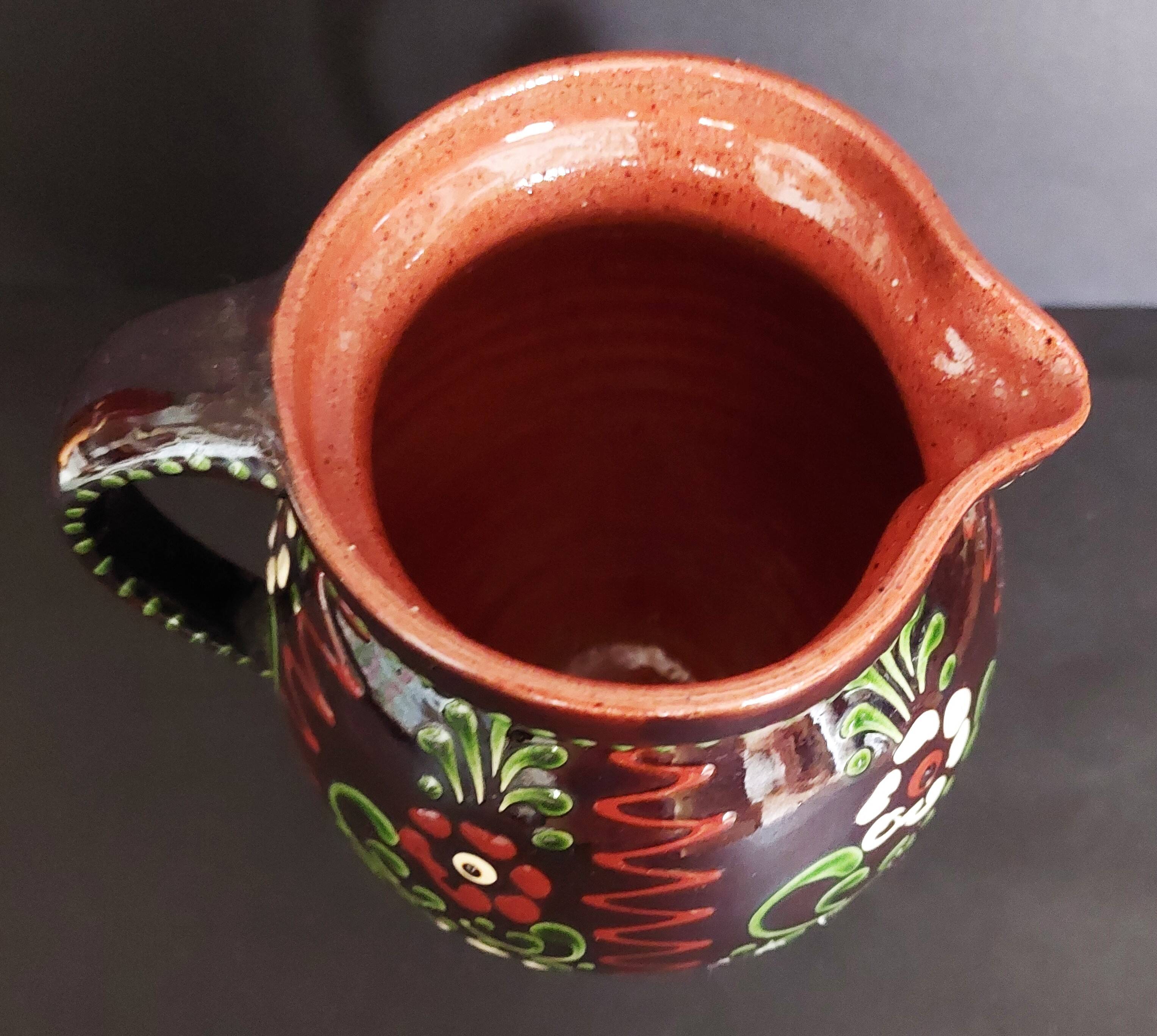 20th century Alsace glazed terracotta pitcher