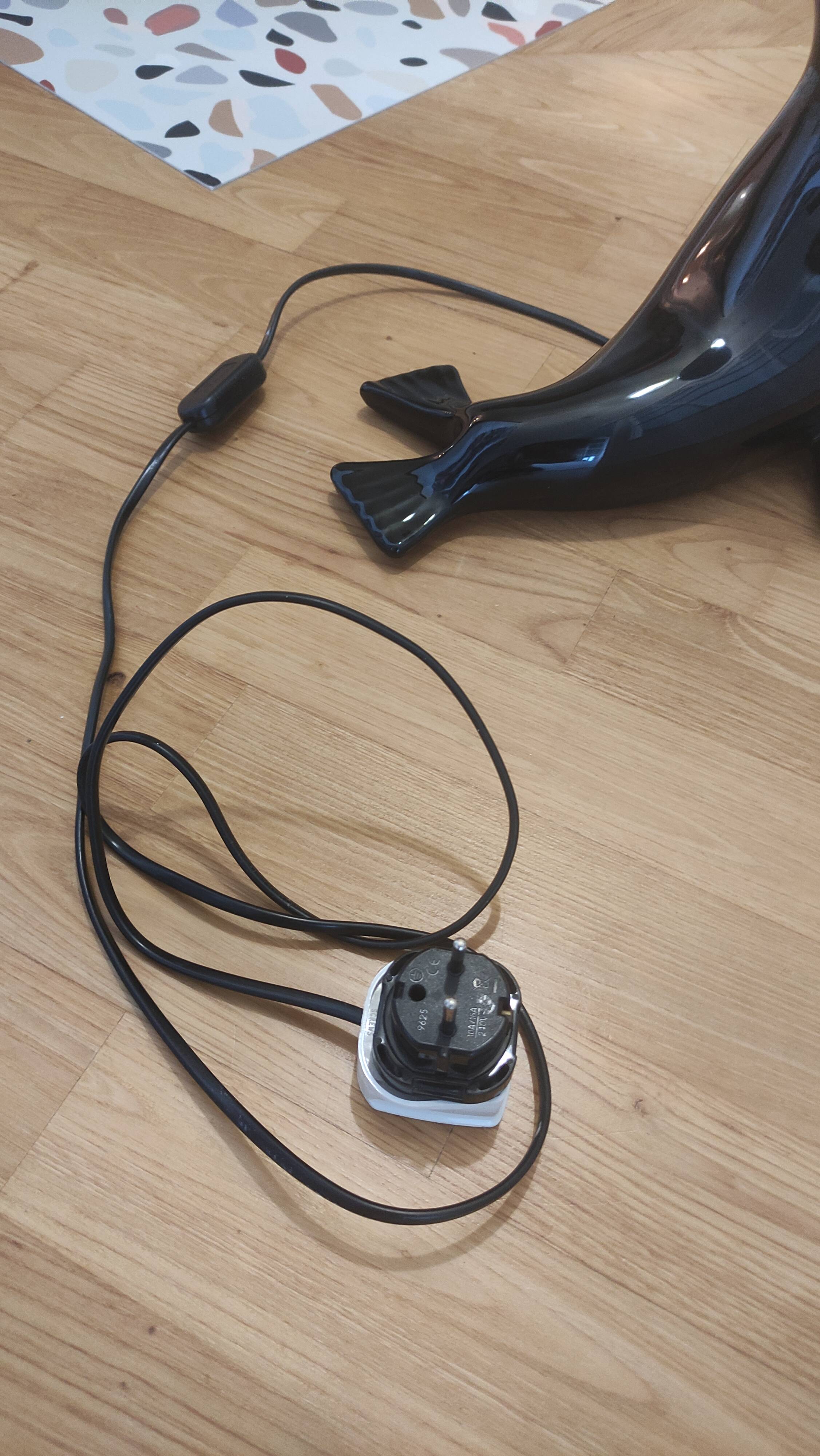 Vintage black sea lion lamp