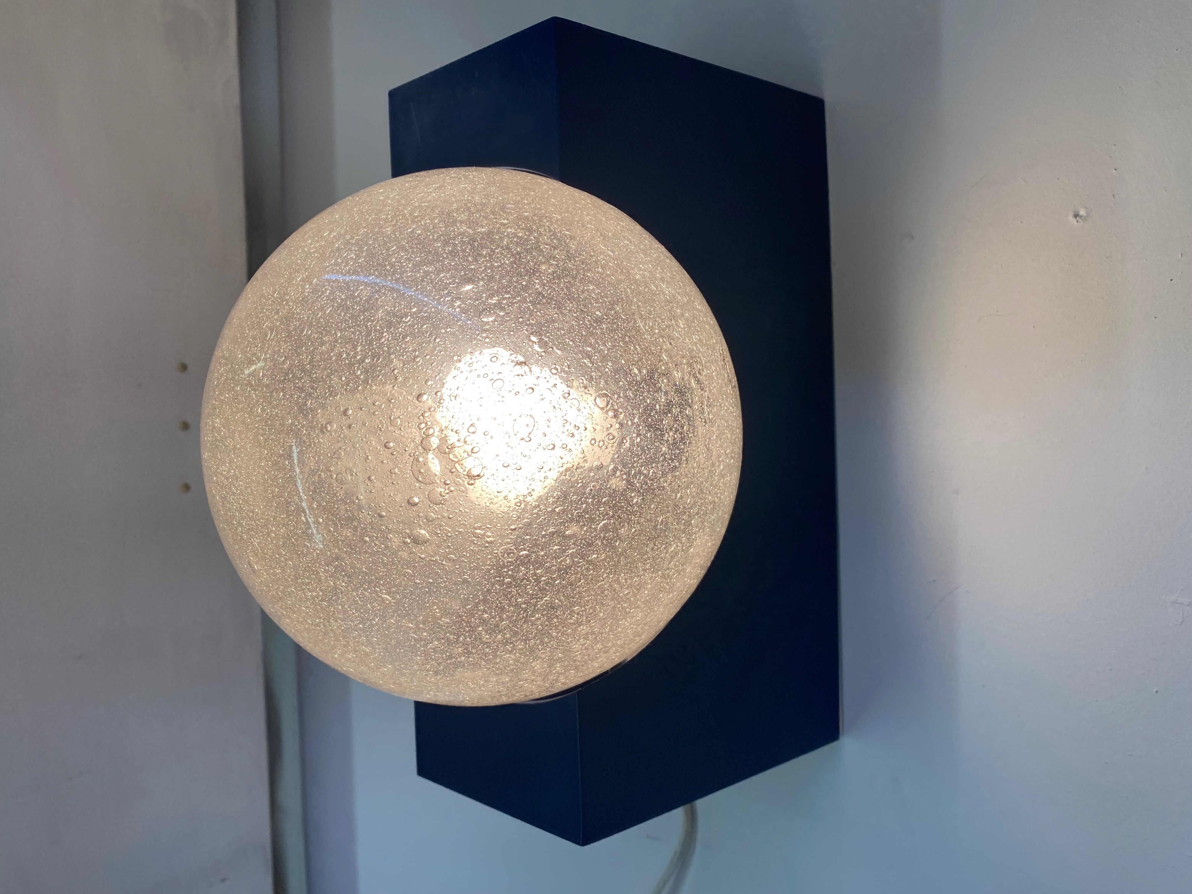 Vintage wall lamp by Raak design 1960