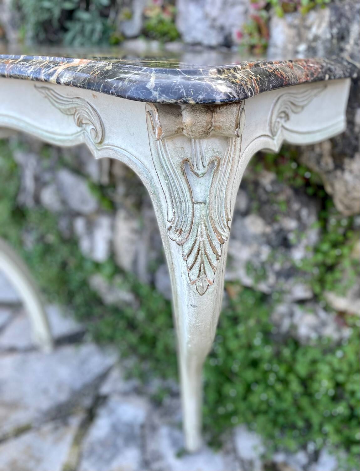 Wall console in painted, carved and molded wood in Louis XV style.