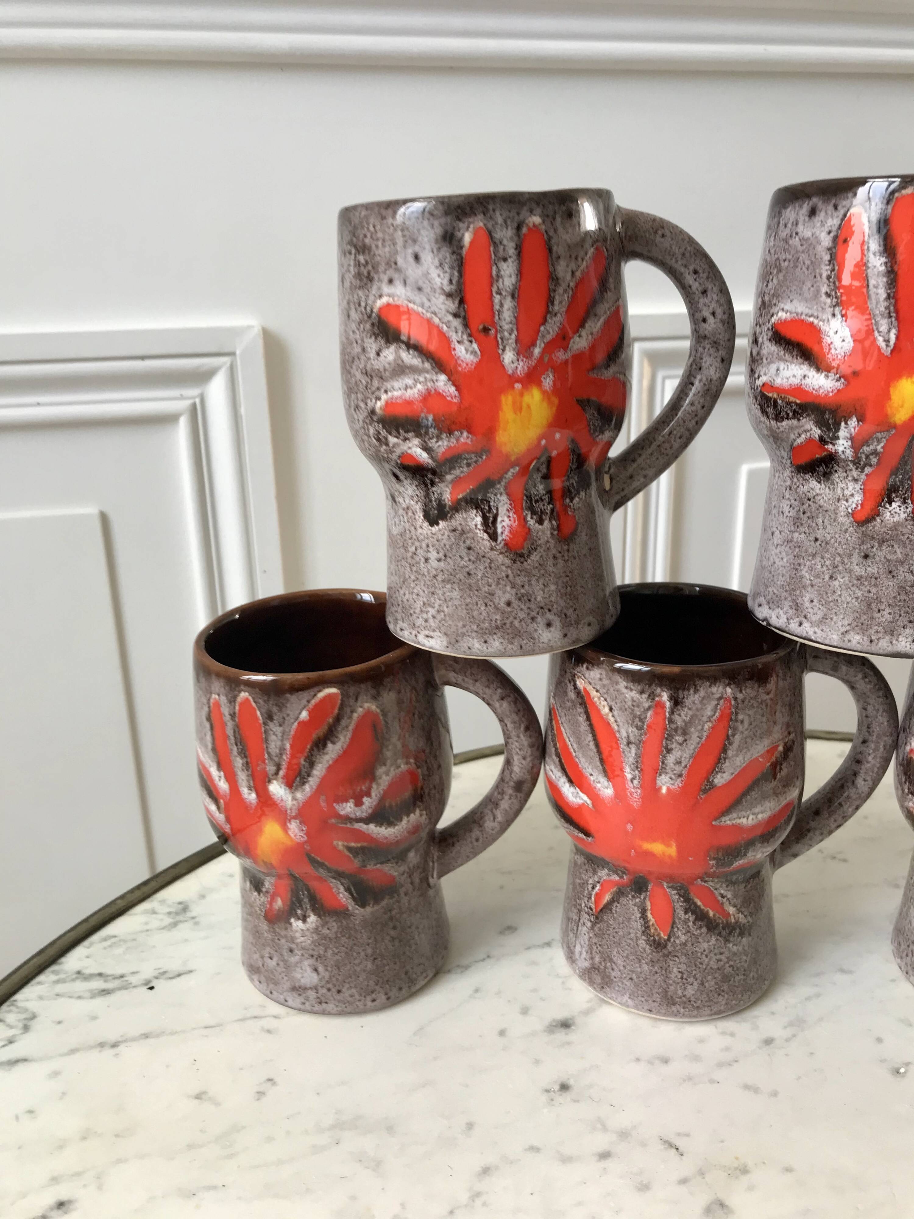 Set of 7 fat lava glazed ceramic mugs signed poët laval 70s