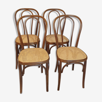 Suite de quatre chaises bistrot cannées