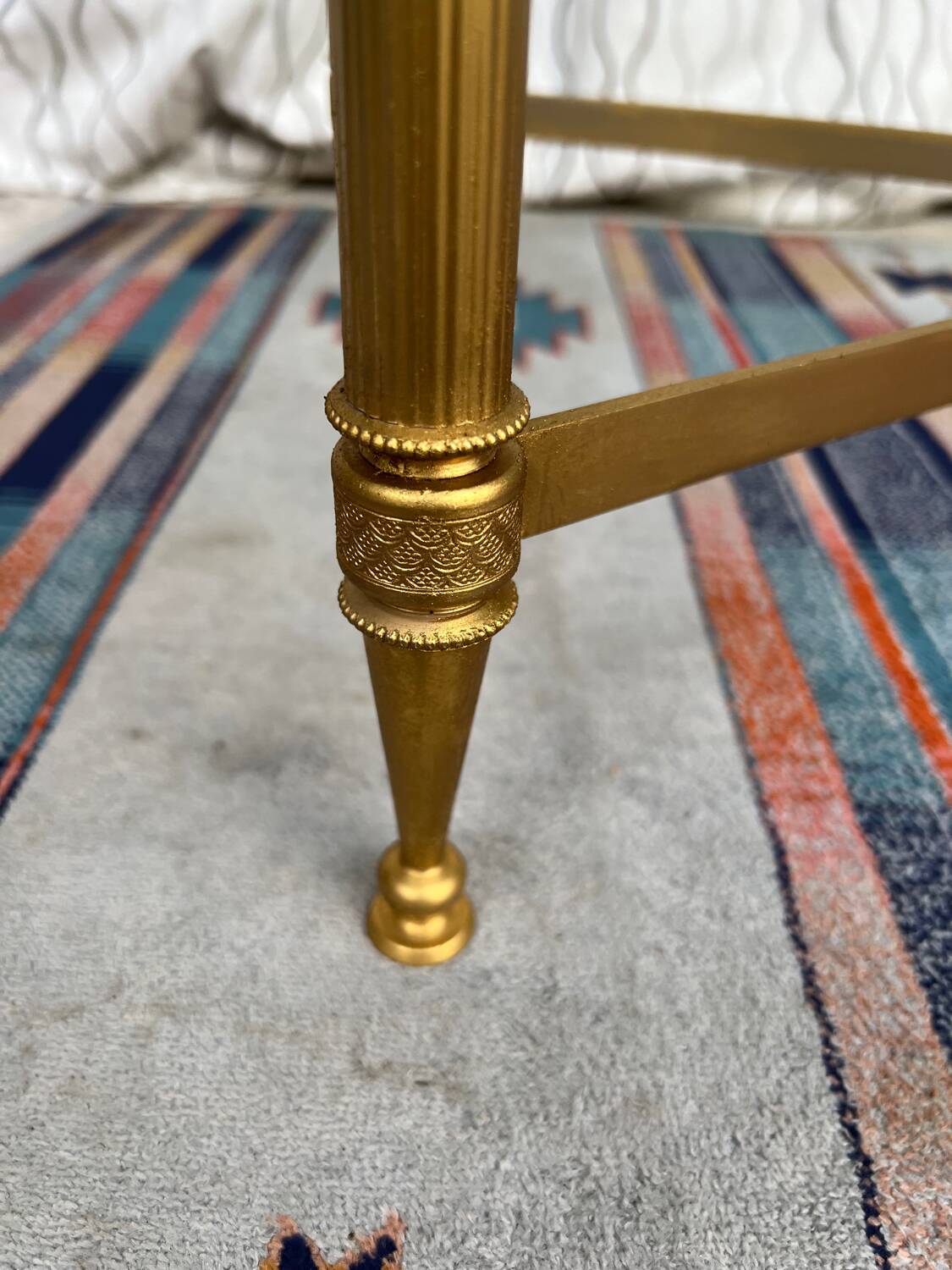 Vintage gold coffee table. Glass top.