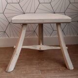 White brutalist tripod stool.