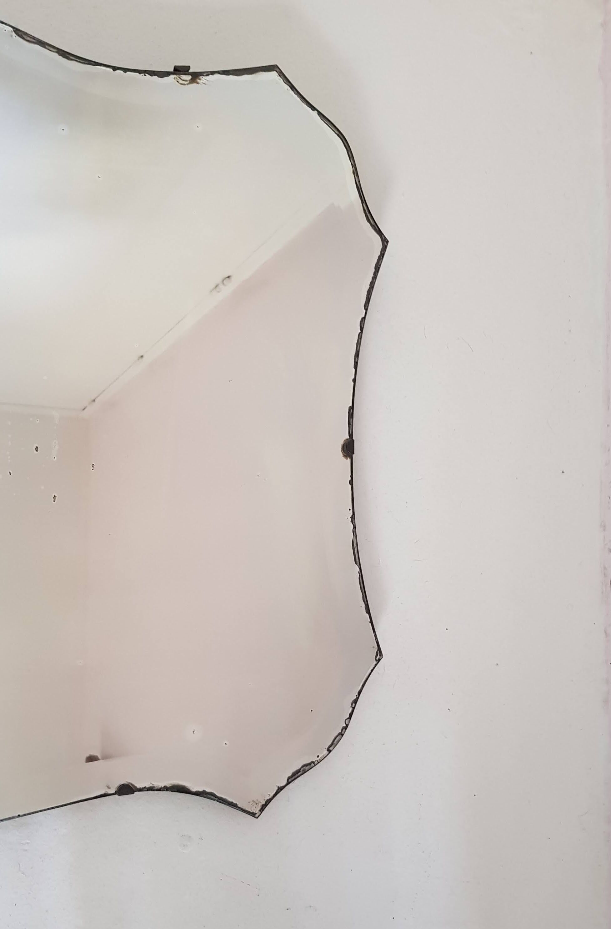 Antique beveled mirror